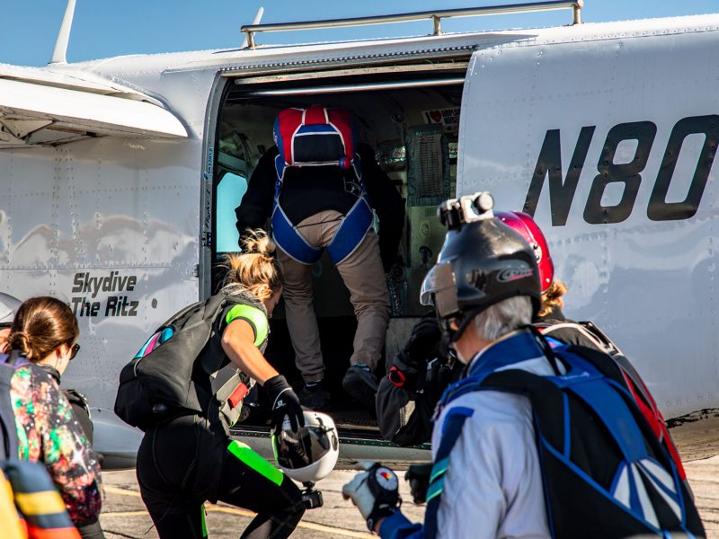 brad-4-web getting onto the plane at Skydive Mesquite near St George